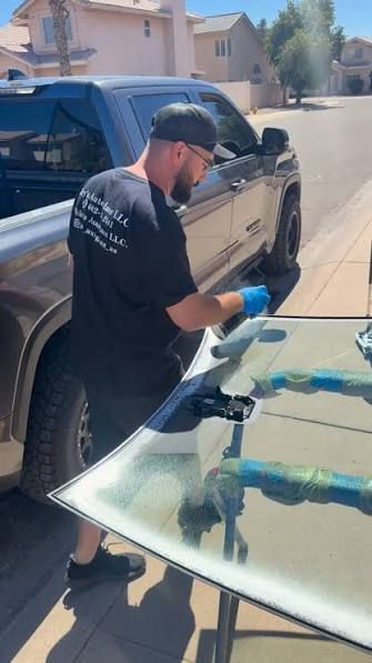 Mobile windshield install at a customer's driveway in Mesa, AZ
